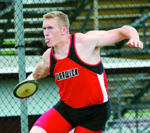 Warwick junior David Lucas prepares to release one of his discus throw attempts at the L-L League Championships last Saturday.
